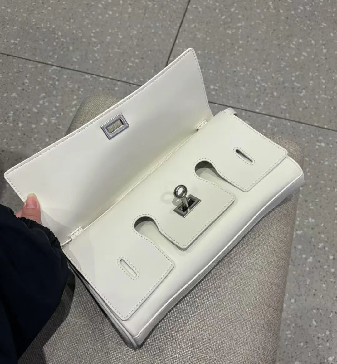 Genuine leather handbag 2025 new niche design lock small square bag vintage motorcycle style cowhide one-shoulder crossbody bag